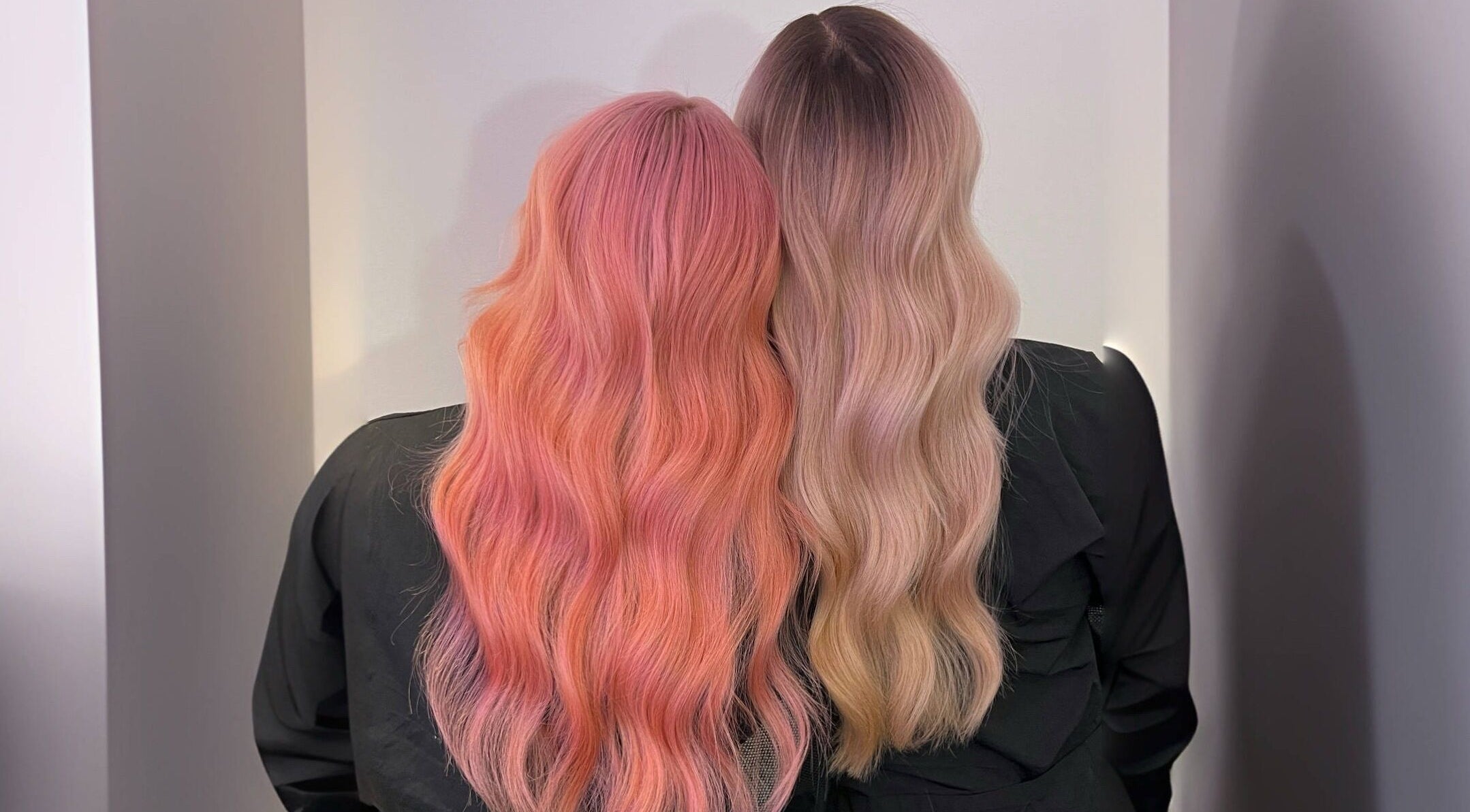 Two models with pastel hair colors at Cosmo Hair Salon, Melbourne, Victoria, AU.