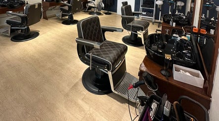 Inside HILLMEN HAIR STUDIO MASJID TANAH in Masjid Tanah, Malacca, MY featuring stylish barber chairs.