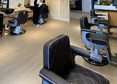 Modern interior of HILLMEN HAIR STUDIO AYER KEROH, featuring stylish barber chairs in Ayer Keroh, Melaka, MY.
