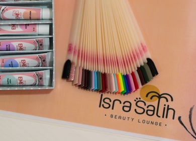 Nail color palette and products at Isra Salih Beauty Lounge, located in الشارقة, إمارة الشارقةّ, AE.