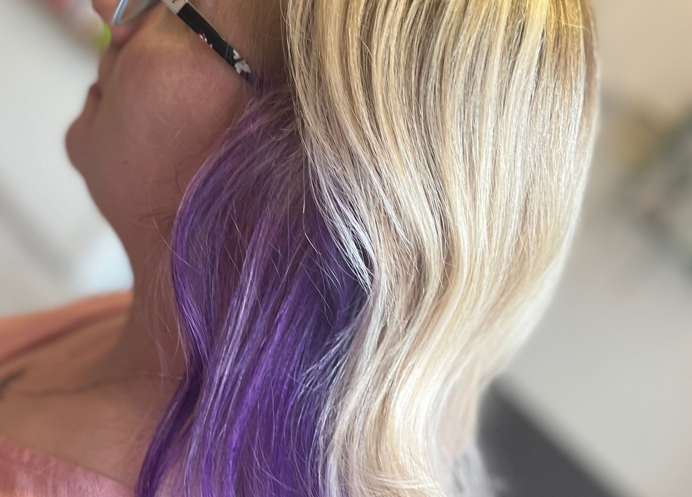 Blonde with purple highlights at Hair by Lyds, Pontypridd, Wales, GB. Stylish hair transformation.