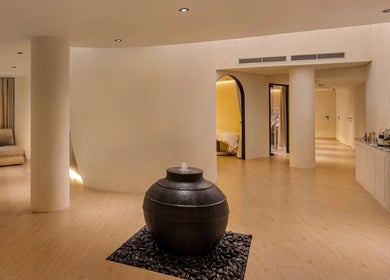 Serene atrium at Casa Aire Wellness, Dubai, Dubai, AE with soft lighting and tranquil decor for relaxation.