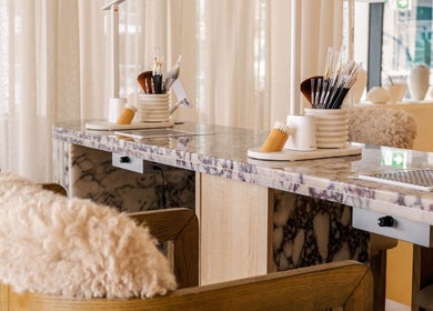 Luxurious beauty station at Casa Aire Wellness, Dubai, Dubai, AE, with marble accents and plush seating.