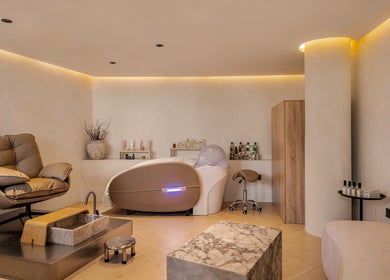 Elegant spa room at Casa Aire Wellness, Dubai, Dubai, AE, featuring plush seating and modern decor.
