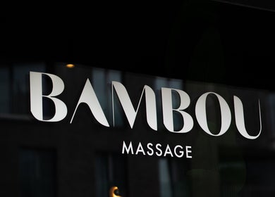 Enseigne de Bambou Massage située à Uccle, Bruxelles, BE, mettant en avant un design moderne et attrayant.
