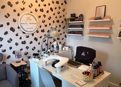 Elegant nail salon setup at The Nail Nook, Horley, England, GB with stylish decor and extensive polish options.