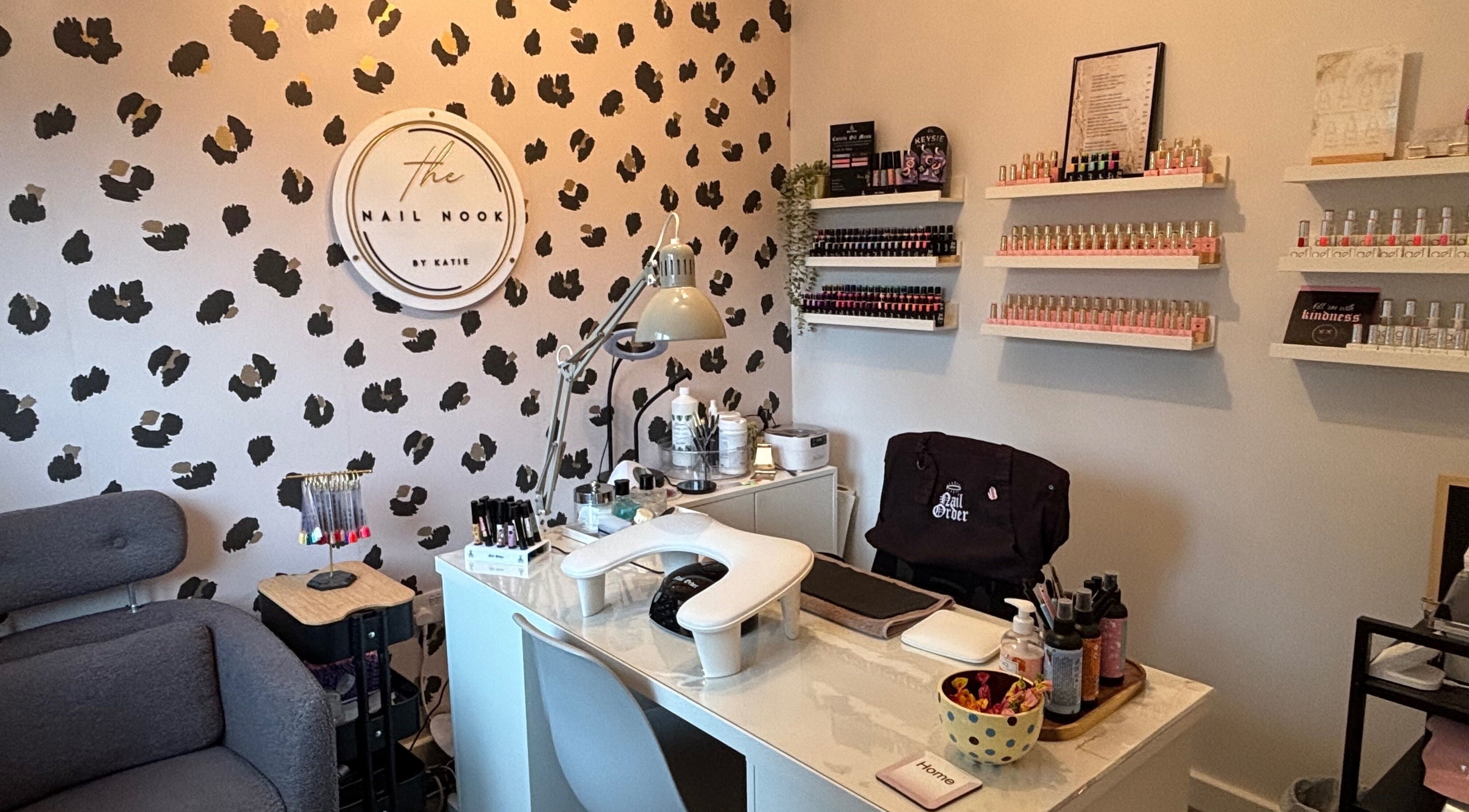 Elegant nail salon setup at The Nail Nook, Horley, England, GB with stylish decor and extensive polish options.