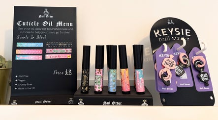 The Nail Nook in Horley, England, GB showcases a vibrant array of cuticle oils and nail savers.