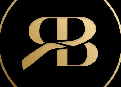 Das goldene Logo von Ringbrows in Emmendingen, Baden-Württemberg, DE, auf schwarzem Hintergrund.