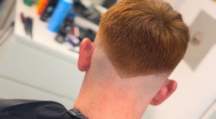 Precision haircut with a sharp fade at U B U Creative in Lichfield, England, GB.