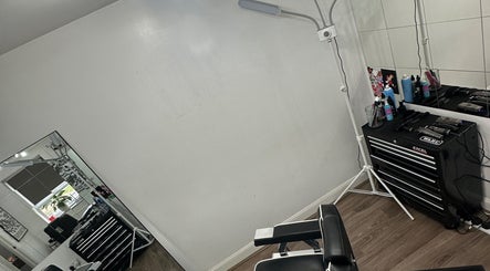 Modern beautician station at U B U Creative, Burntwood, England, GB, featuring tools and a large mirror.