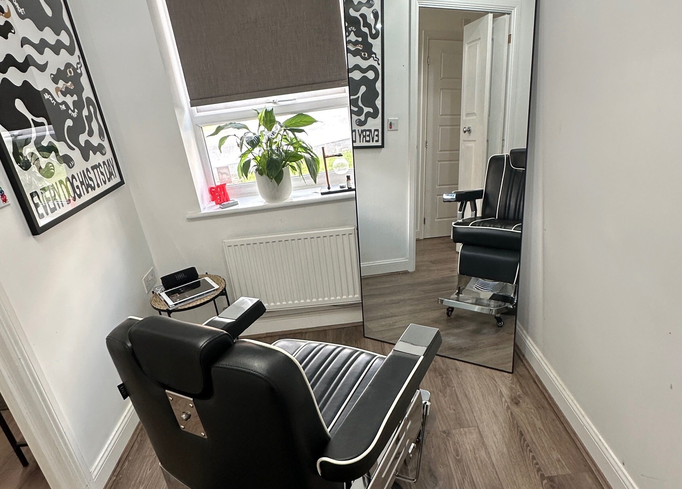 Elegant salon corner at U B U Creative, Burntwood, England, GB, featuring stylish decor and comfy chair.