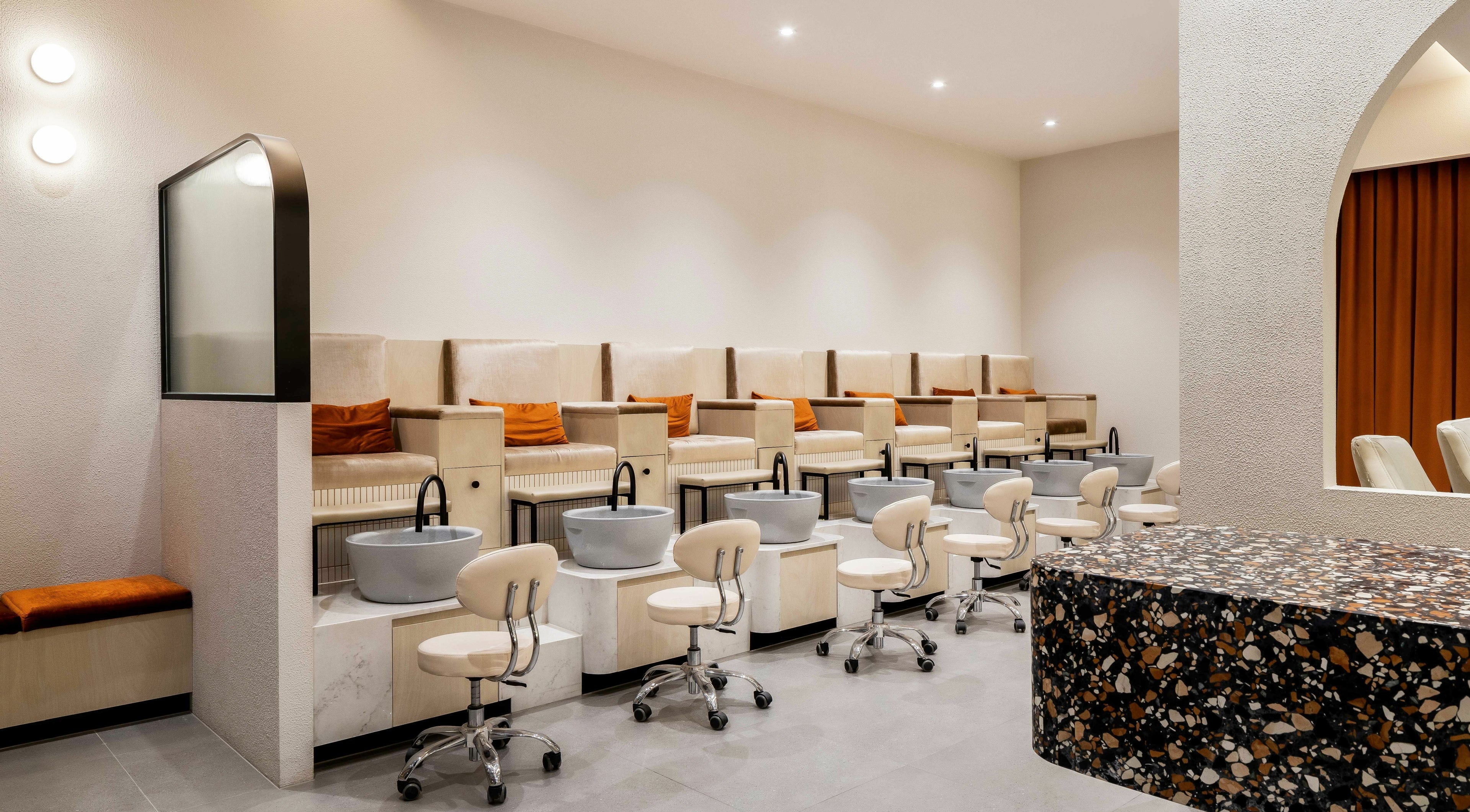 Modern pedicure stations at Nail Bar Company - Knox, Wantirna South, VIC, AU with sleek design.