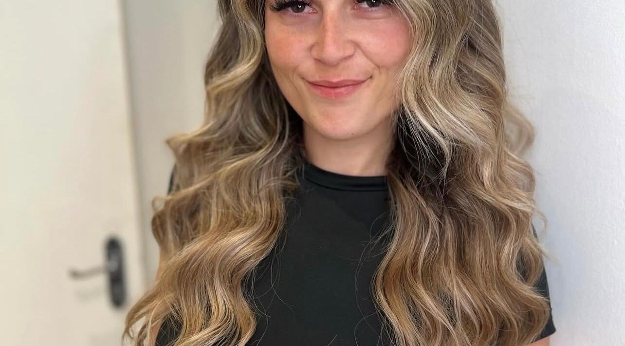 Styled by Court in Sutton, England offers stunning wavy hair transformations for a refreshed look.