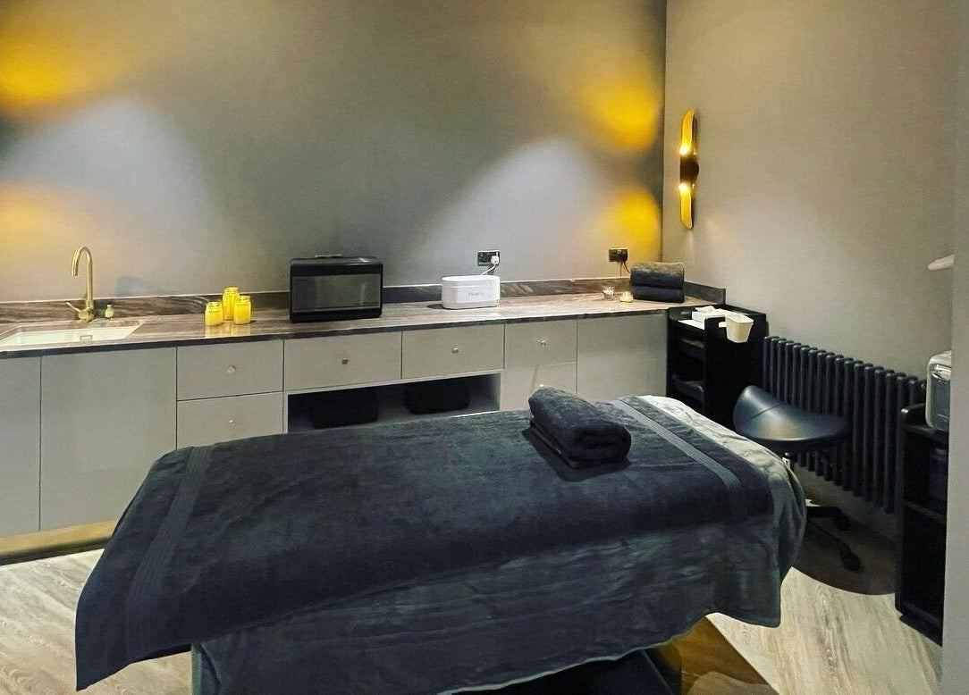 Luxurious treatment room at Avanzato Grooming Lounge, London, England, GB featuring elegant design and ambient lighting.