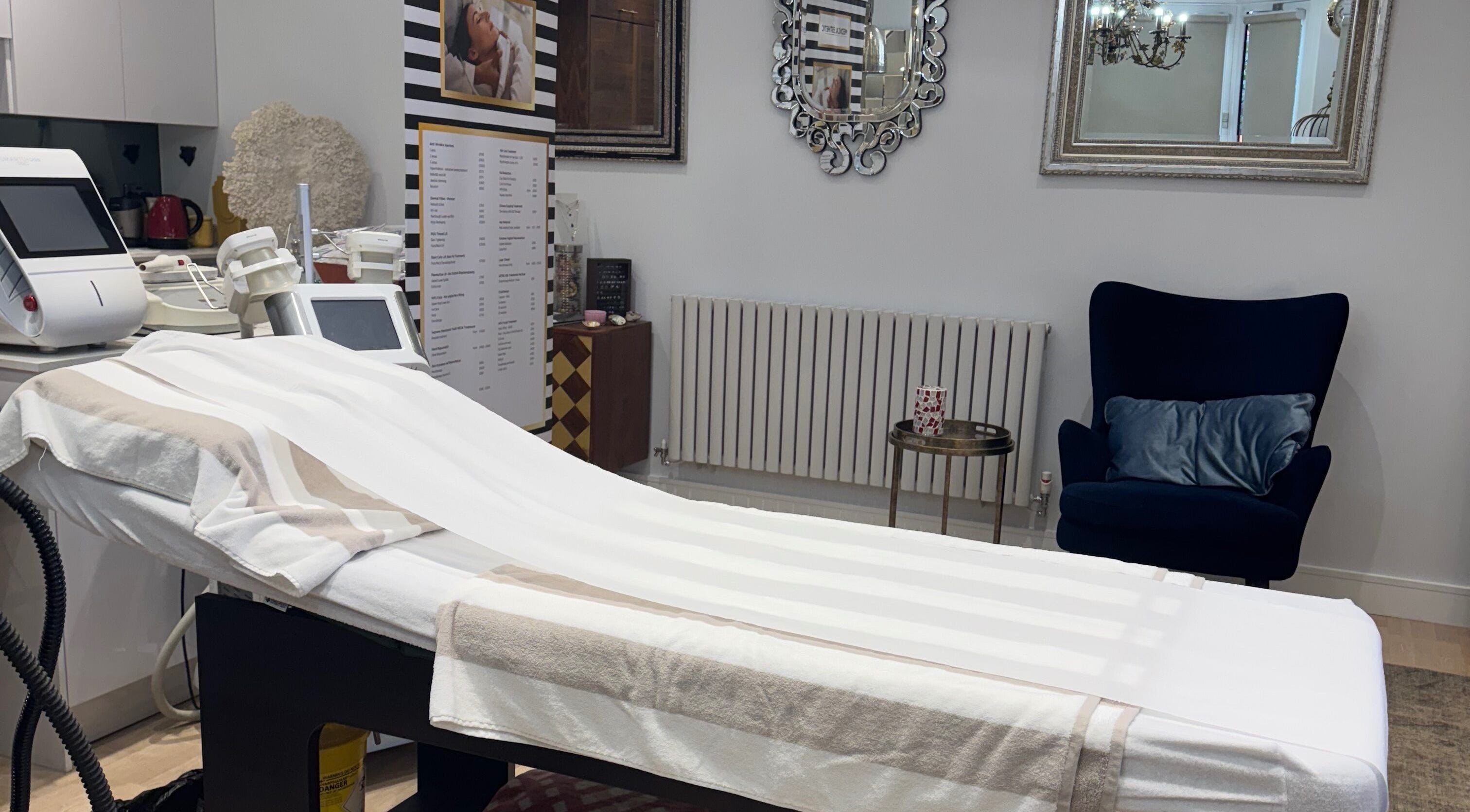 Elegant treatment room at Sabrina Aesthetic, London, England, GB, featuring a stylish chair and modern equipment.