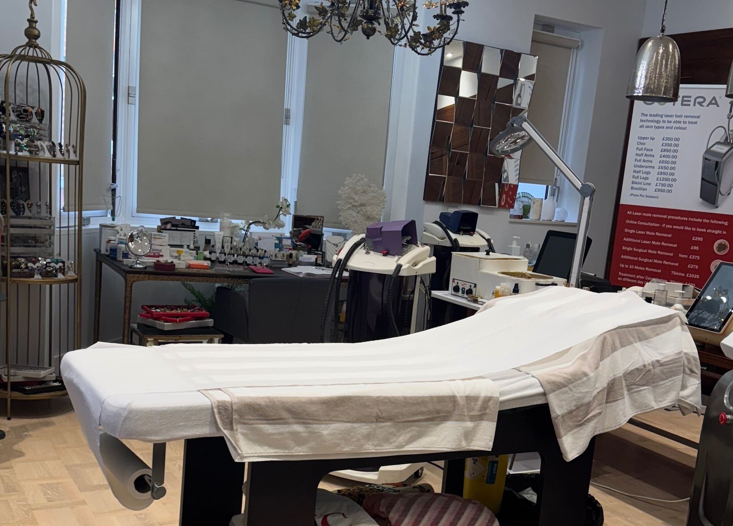 Interior of Sabrina Aesthetic in London, England, GB showcasing treatment room with modern equipment.