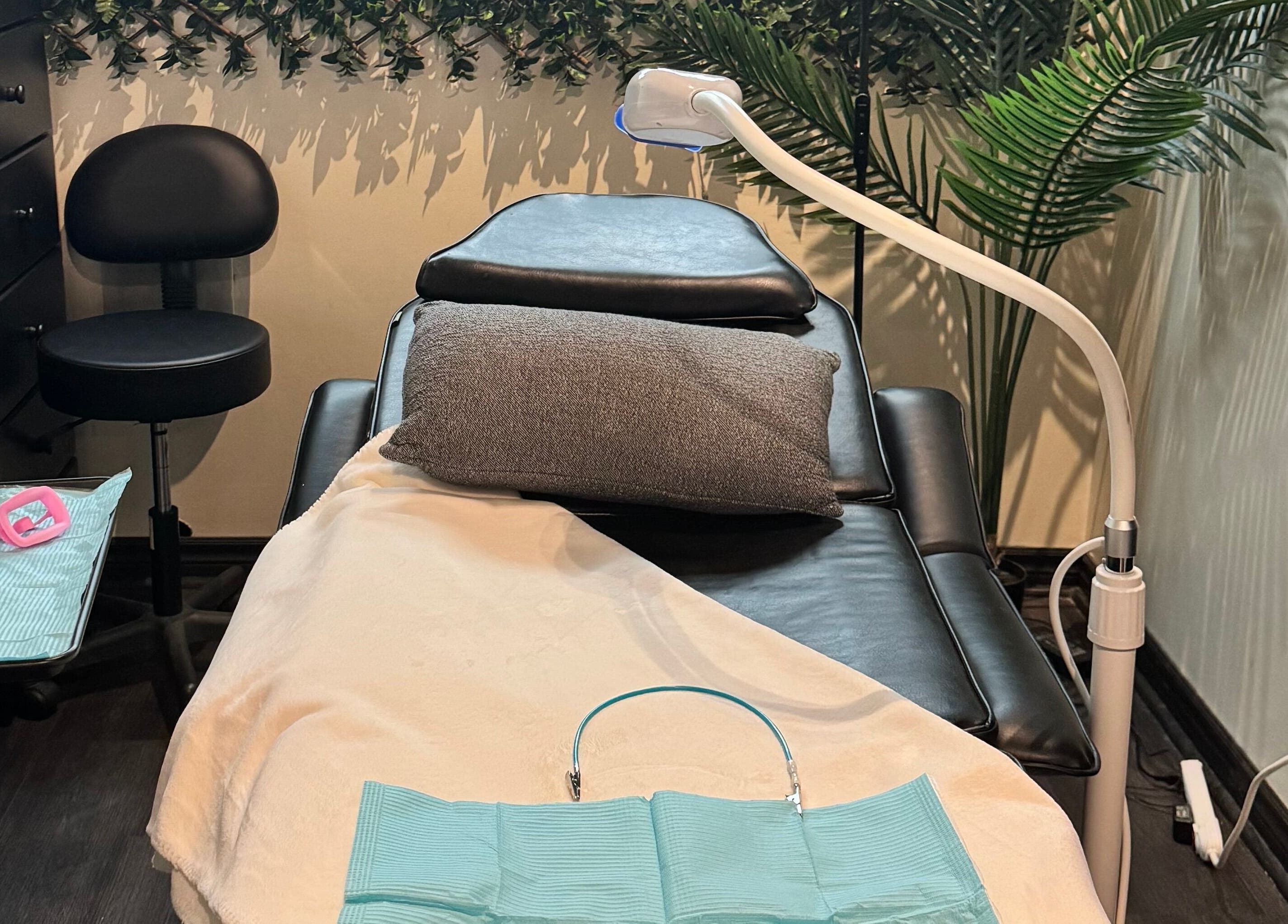 Cozy treatment bed at Tuscany Studio in Hamilton, Ontario, CA, perfect for relaxation and wellness.