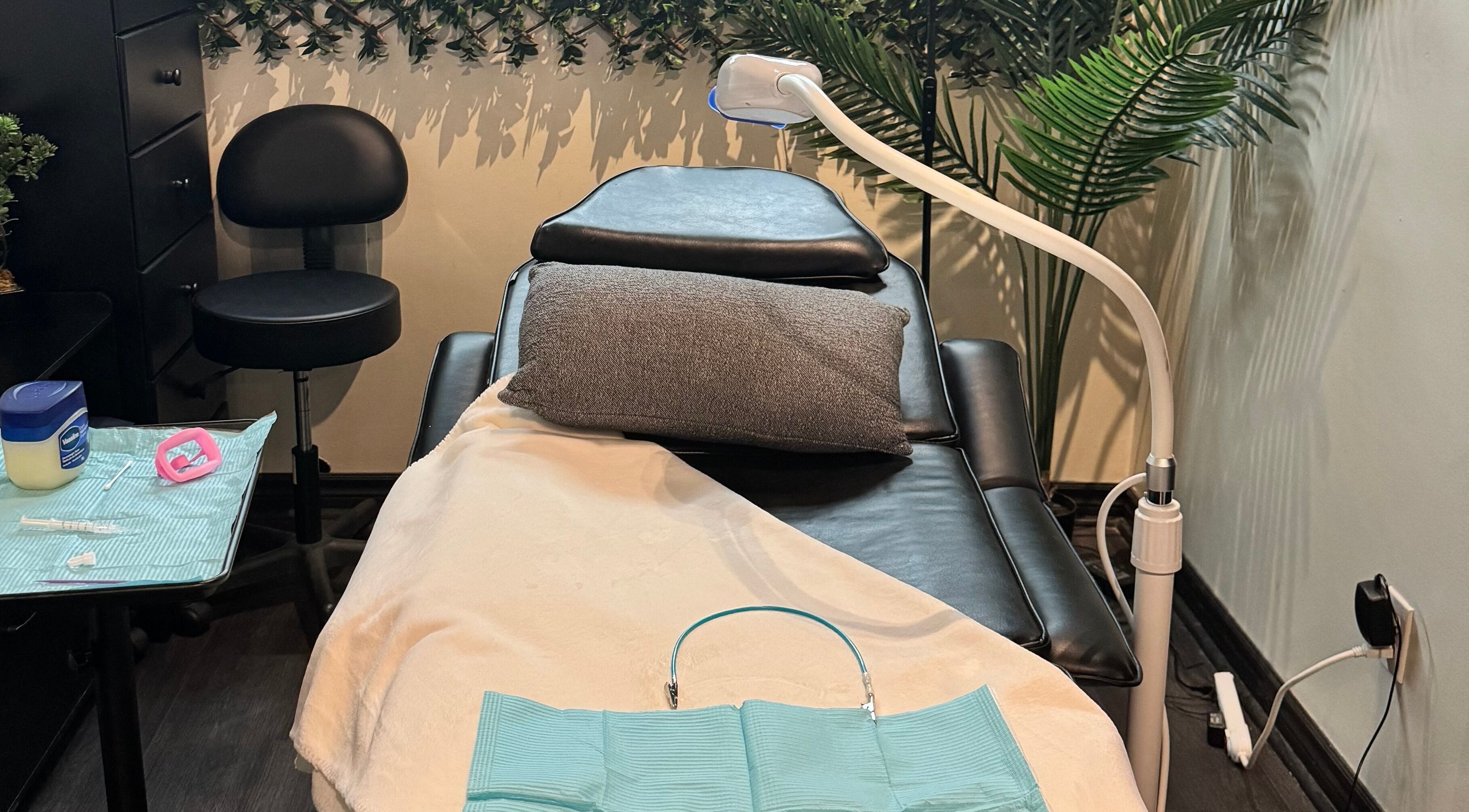 Cozy treatment bed at Tuscany Studio in Hamilton, Ontario, CA, perfect for relaxation and wellness.