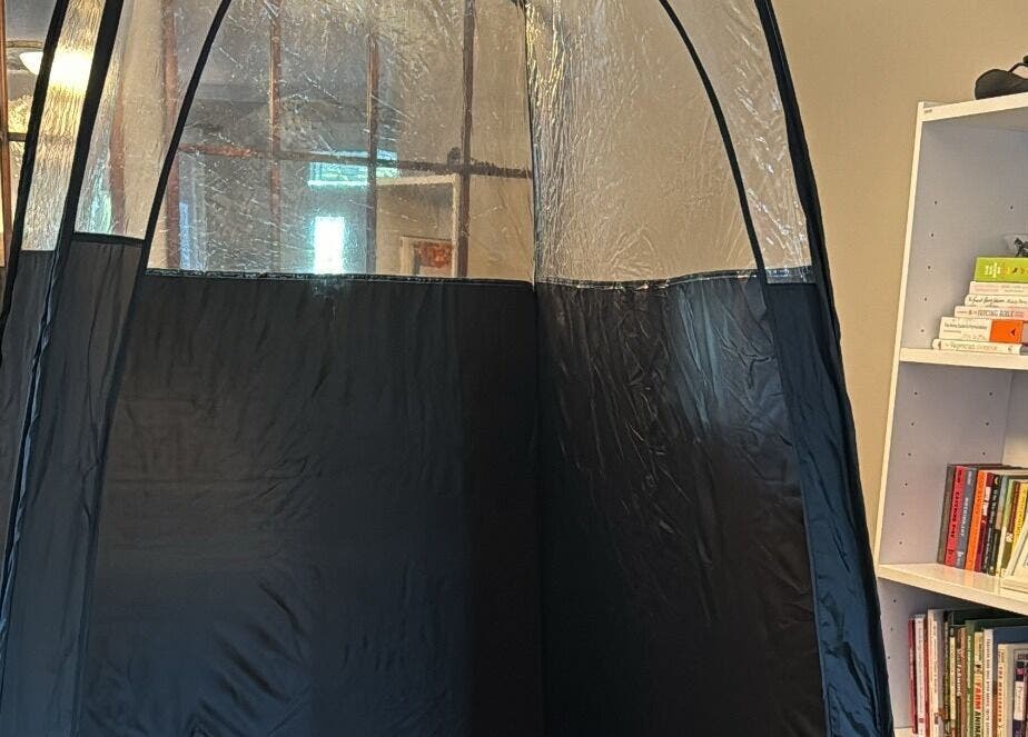 Private wellness nook at Tuscany Studio, Hamilton, Ontario, CA featuring a sleek tent for personal treatments.