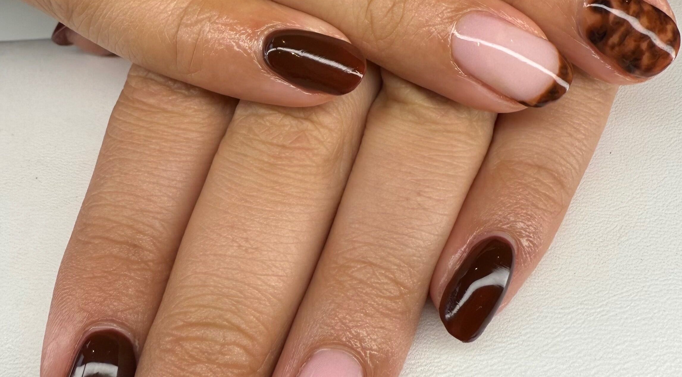Stunning brown and pink manicure at Lucy Watson Beauty, Horsham, England, GB.