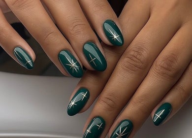 Elegant Russian manicure at Legend Nails, New York, New York, US. Green nails with gold accents.