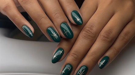 Elegant green nails with star design at Russian manicure - Legend nails, New York, New York, US.
