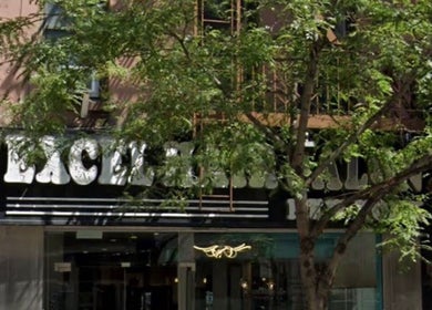 Entrance at Russian manicure - Legend nails in New York, New York, US with stylish signage.