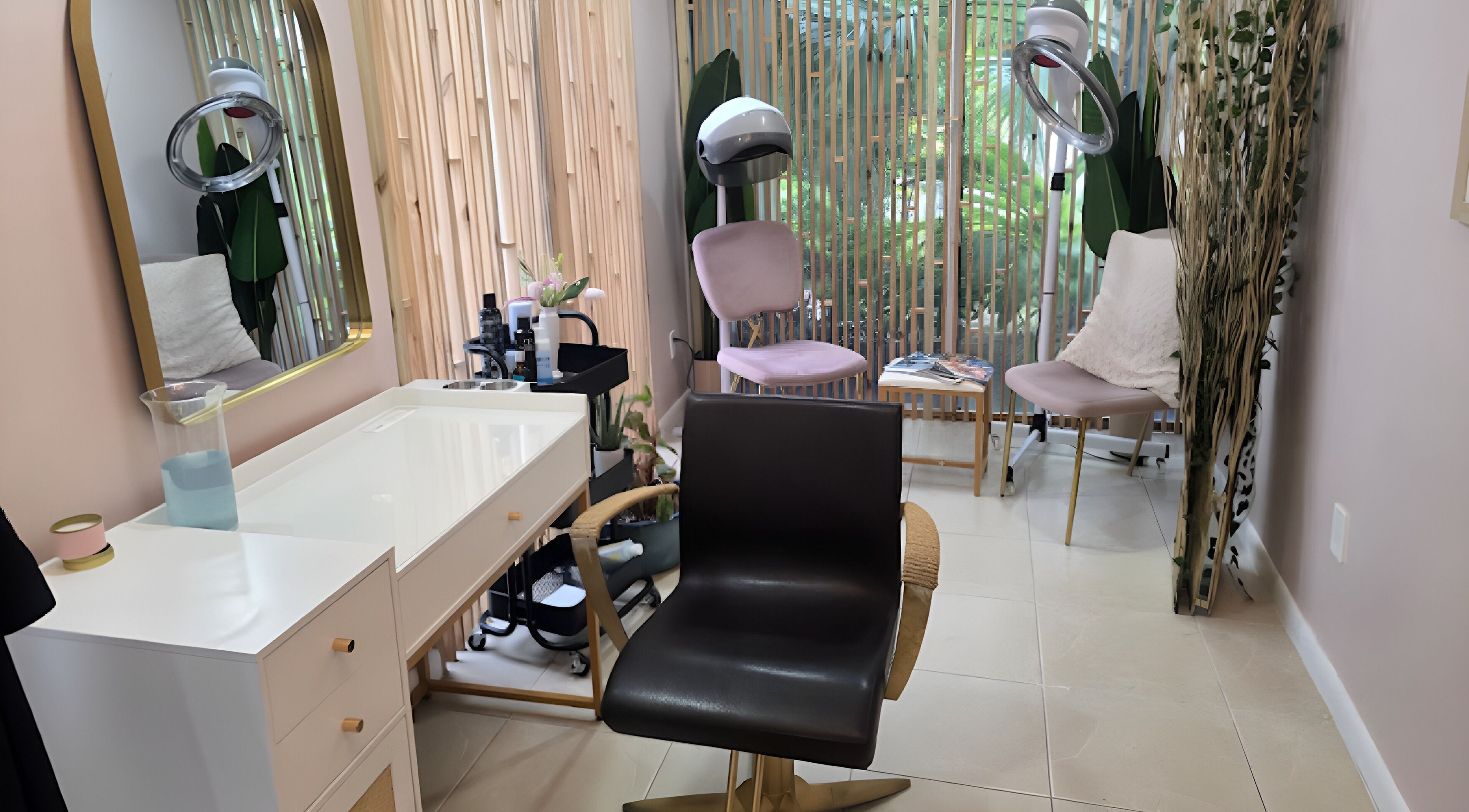 Chic styling area at Snipsky’s Salon and Spa, Freeport, Grand Bahama Island, BS, featuring modern decor and seating.