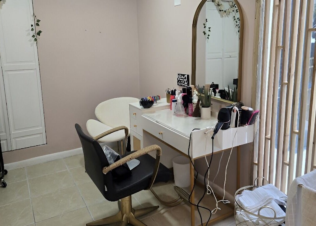 Chic interior of Snipsky’s Salon and Spa, Freeport, Grand Bahama Island, BS with elegant styling station.