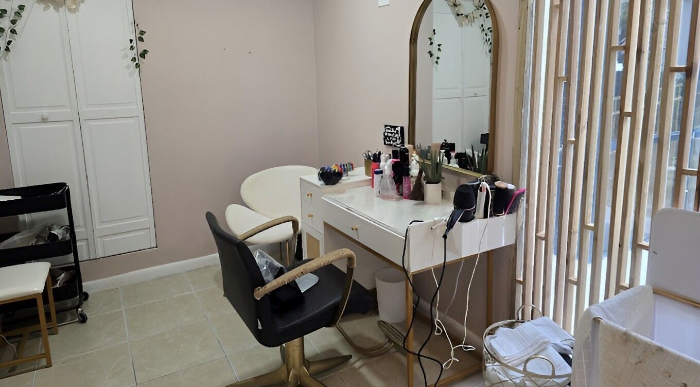 Chic interior of Snipsky’s Salon and Spa, Freeport, Grand Bahama Island, BS with elegant styling station.