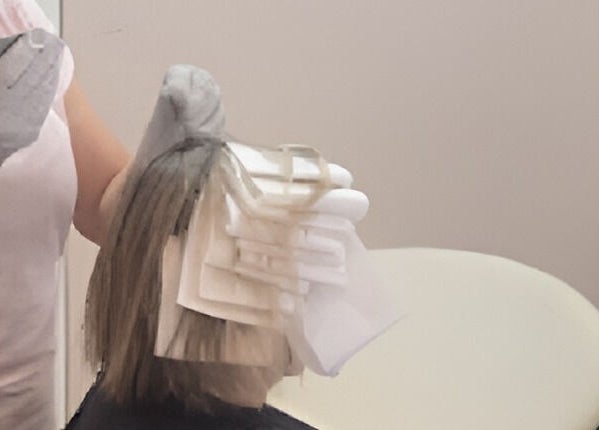 Hair highlighting in progress at Snipsky’s Salon and Spa, Freeport, Grand Bahama Island, BS.