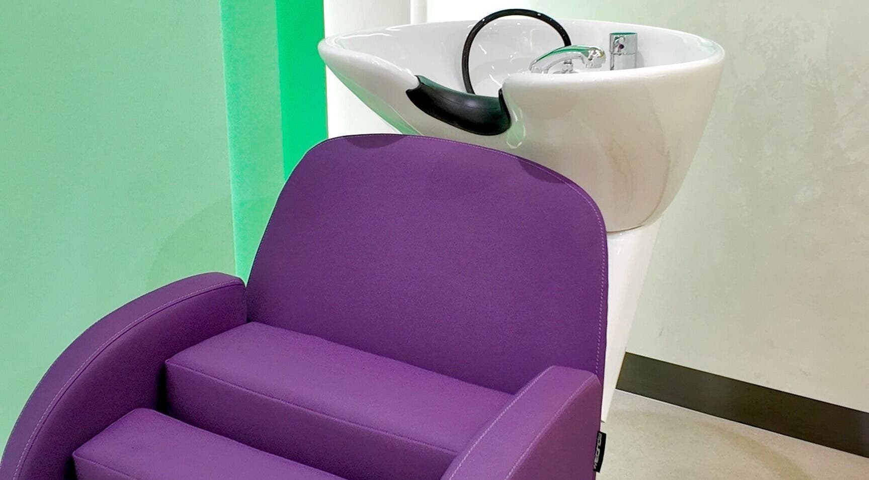 Vibrant purple salon seat at Stories Kids - Mohamed Bin Zayed, Abu Dhabi, Abu Dhabi, AE, offering kid-friendly services.