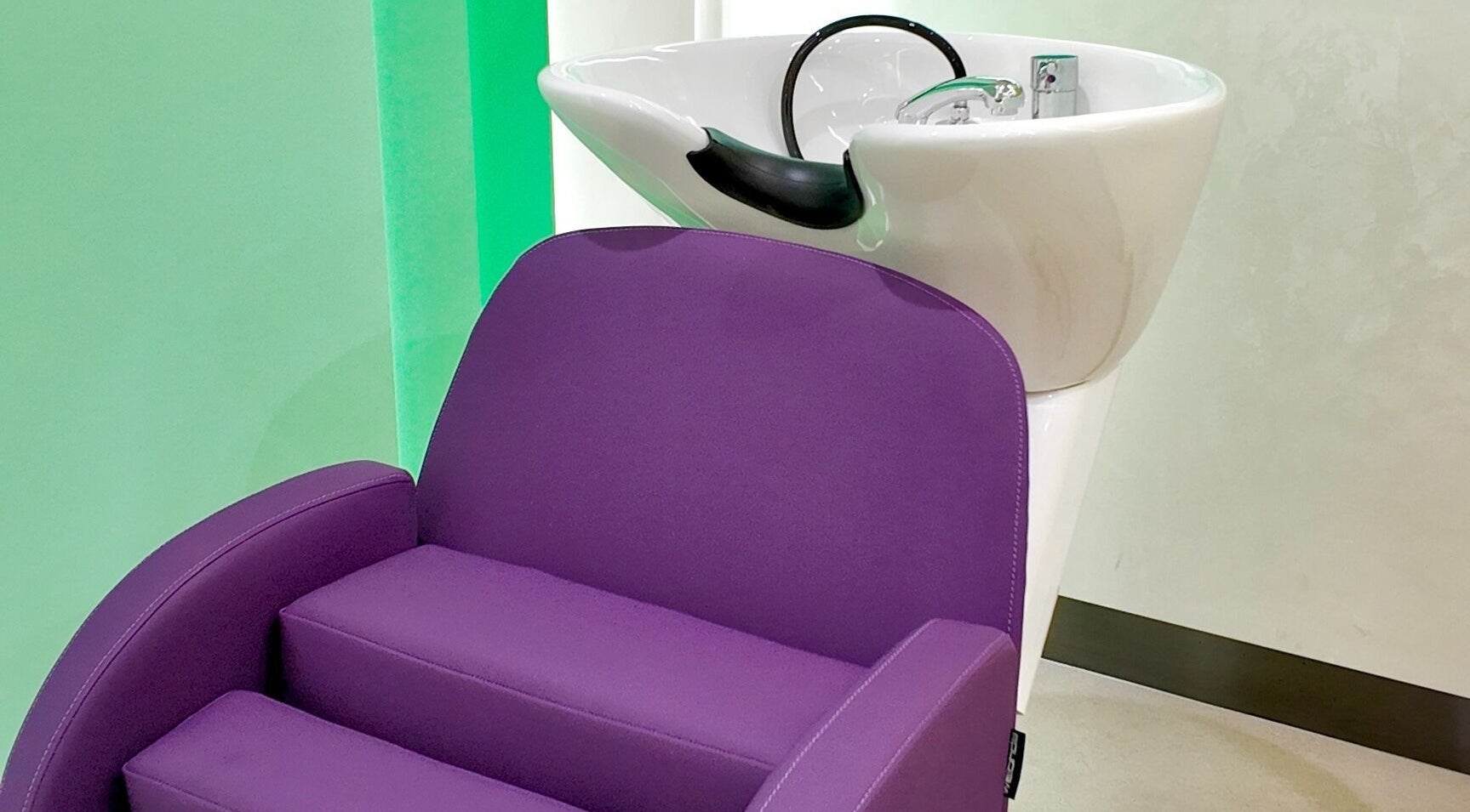 Vibrant purple salon seat at Stories Kids - Mohamed Bin Zayed, Abu Dhabi, Abu Dhabi, AE, offering kid-friendly services.