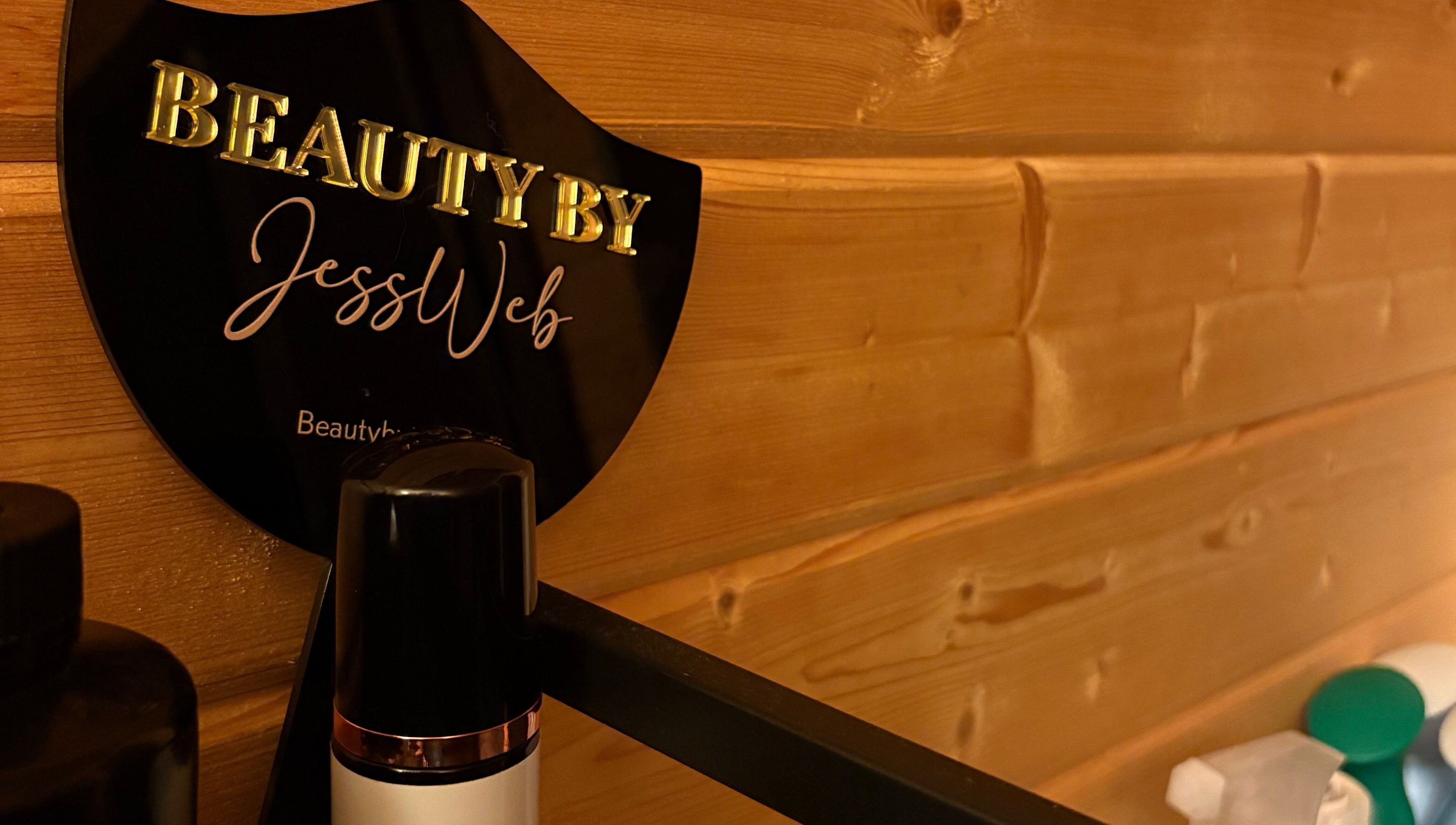 Beauty by Jess Web sign on wooden wall at Nuneaton, United Kingdom, GB venue.