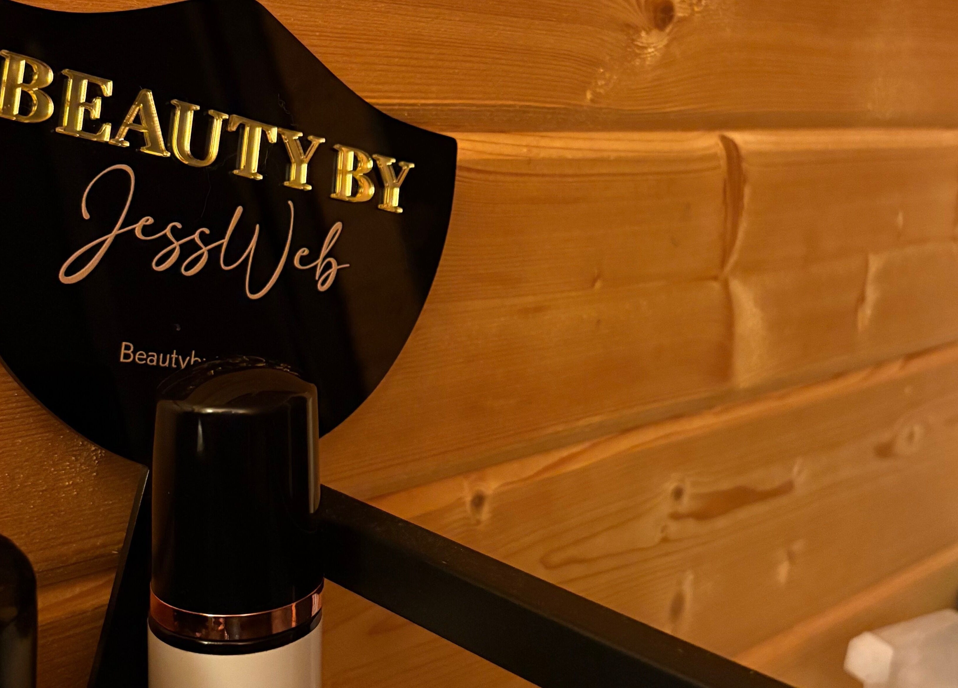 Beauty by Jess Web sign on wooden wall at Nuneaton, United Kingdom, GB venue.