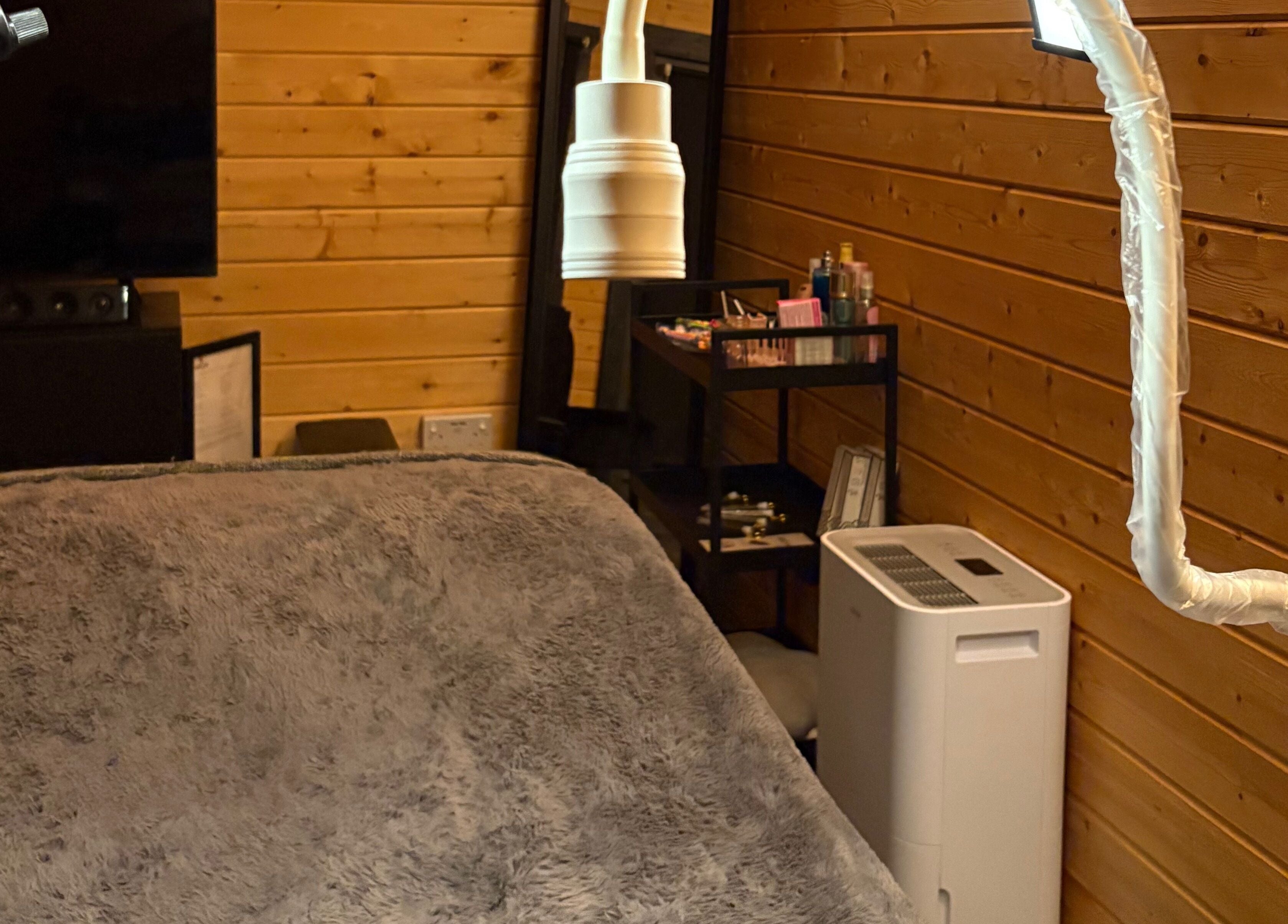 Tranquil treatment room at Beauty by Jess Web, Nuneaton, United Kingdom, GB, featuring plush bedding.