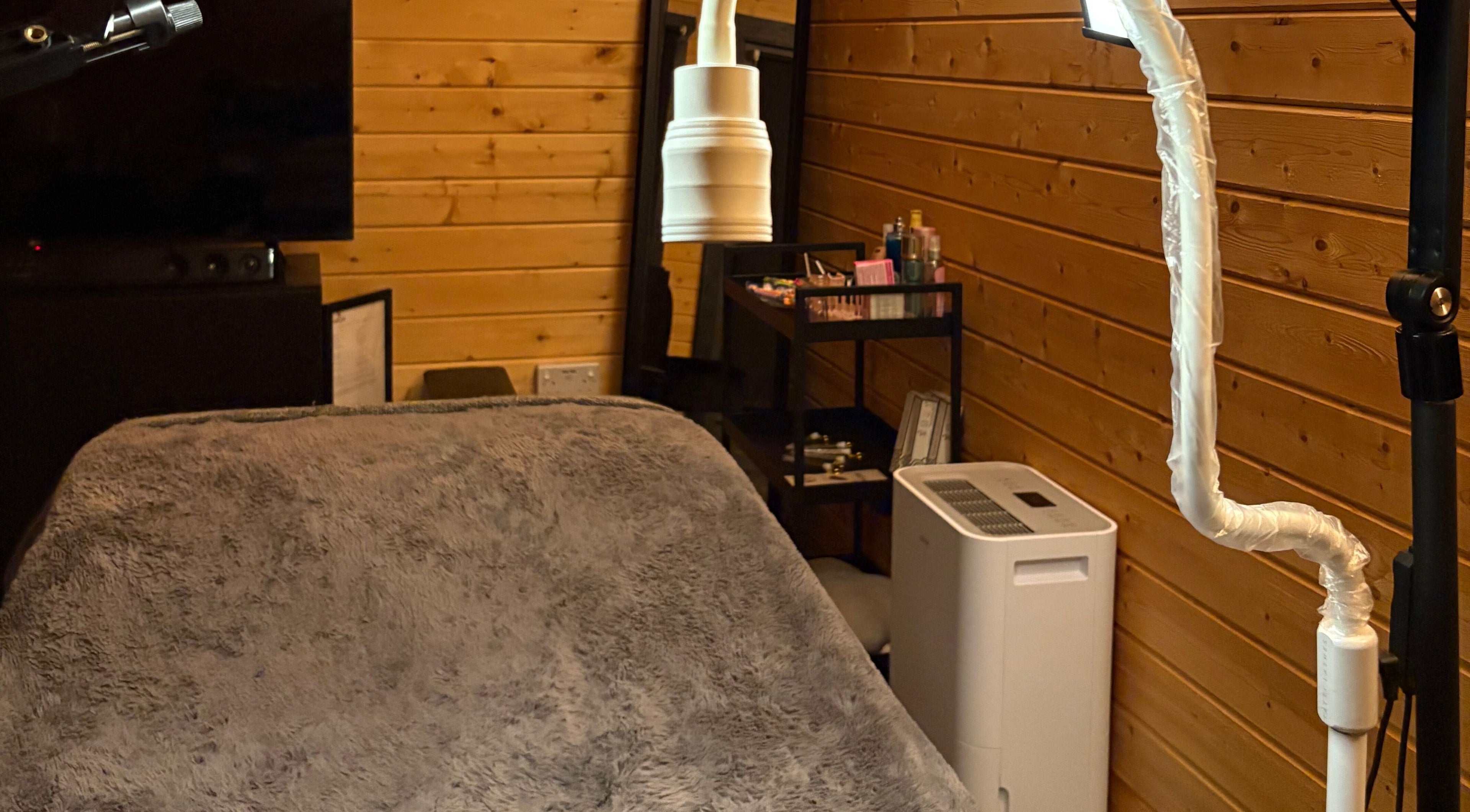 Tranquil treatment room at Beauty by Jess Web, Nuneaton, United Kingdom, GB, featuring plush bedding.