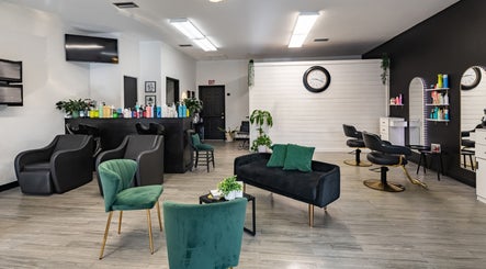 Modern interior of YK Beauty Salon in Bradenton, Florida, US with sleek chairs and vibrant decor.