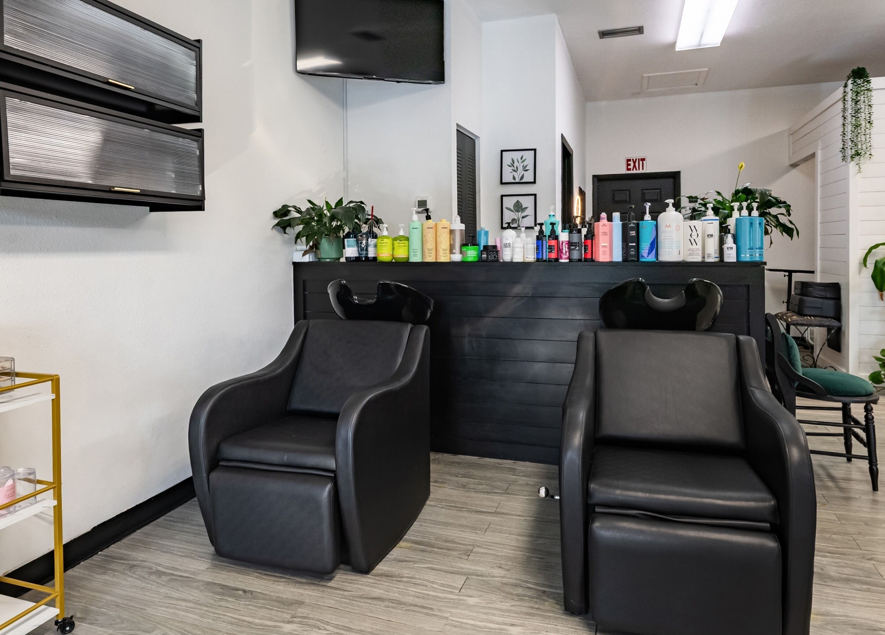 Modern salon chairs at YK Beauty Salon, Bradenton, Florida, US, showcasing sleek design and comfort.