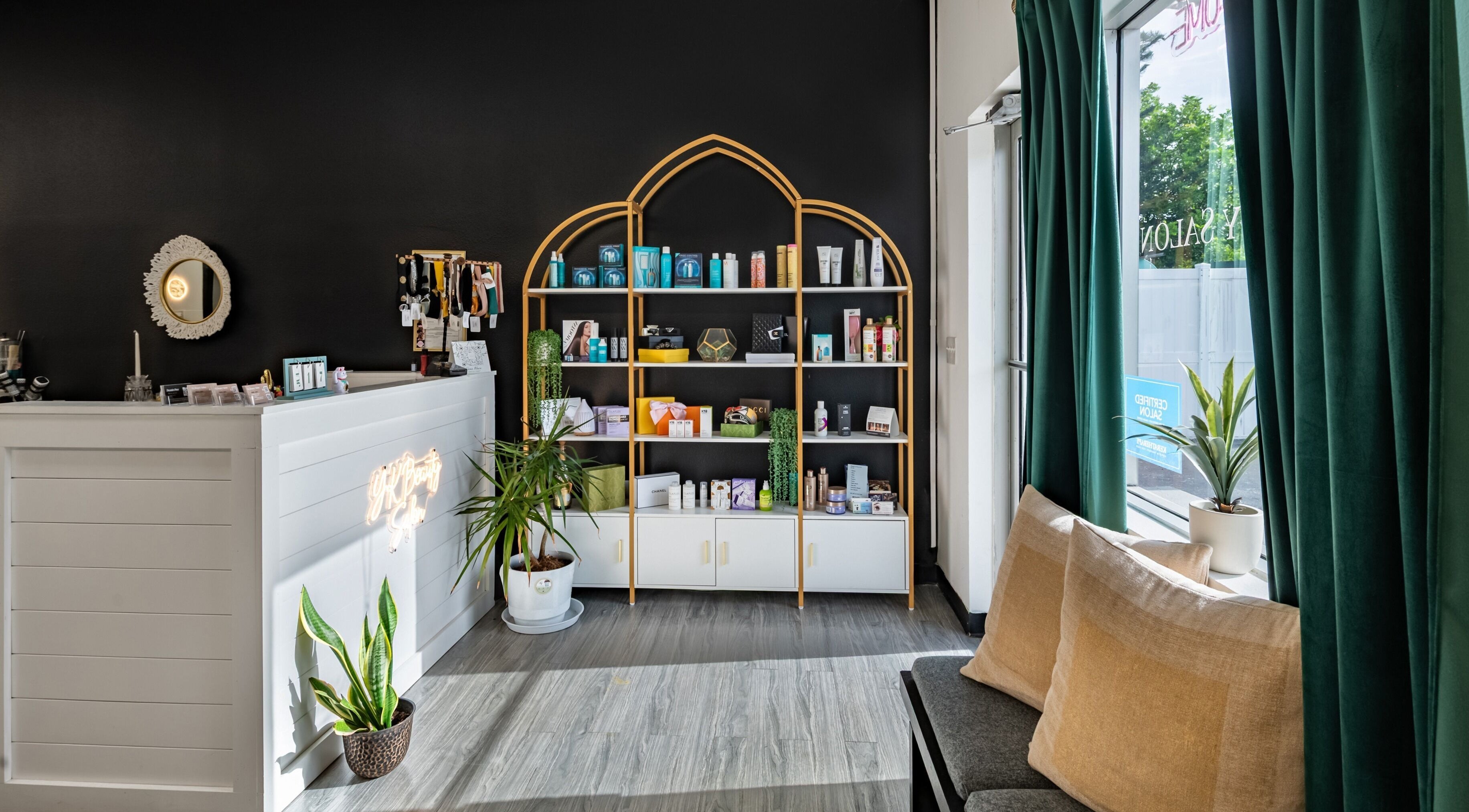 Reception area of YK Beauty Salon in Bradenton, Florida, US with stylish decor and beauty products.