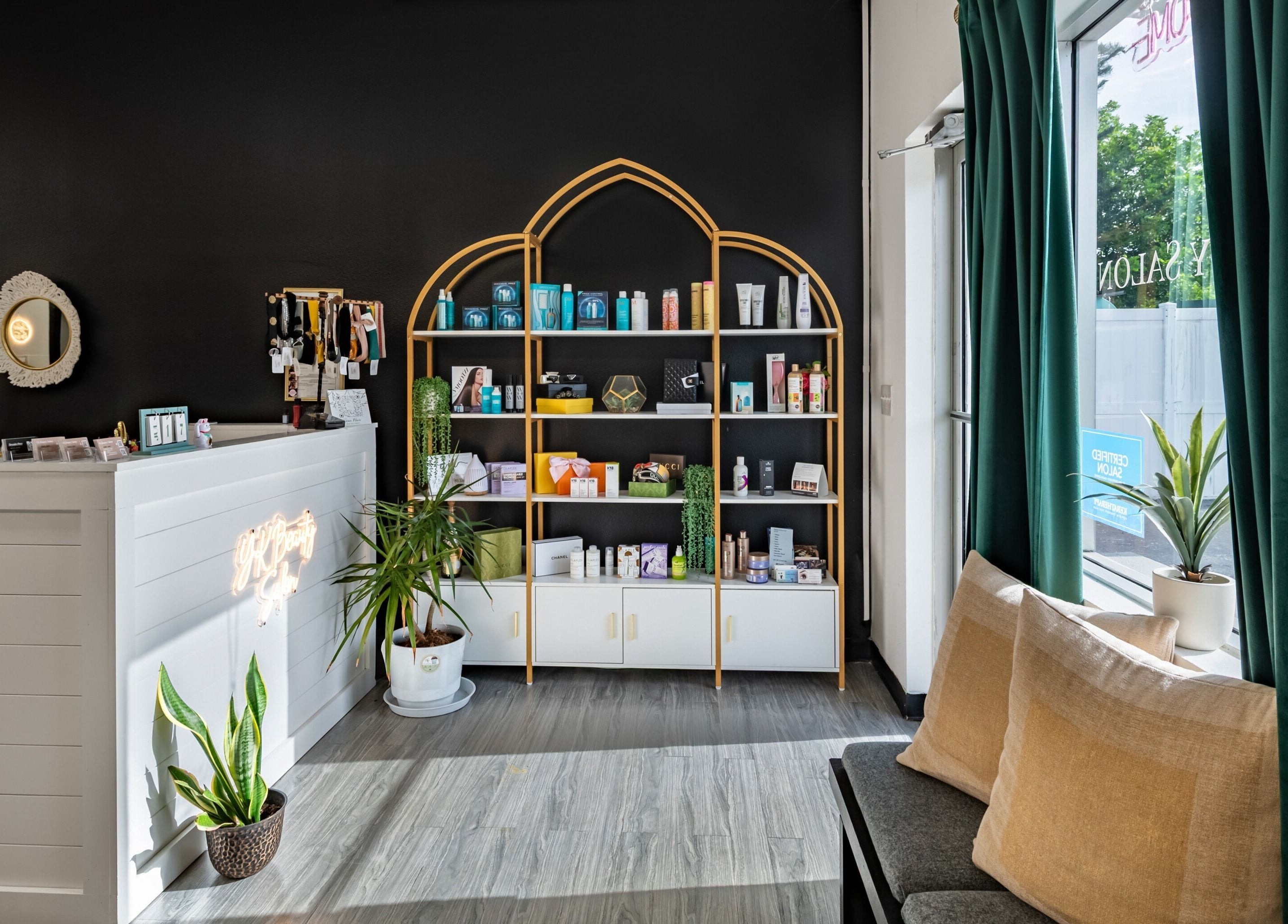 Chic interior of YK Beauty Salon's Bradenton, Florida location showcasing modern decor and a welcoming atmosphere.