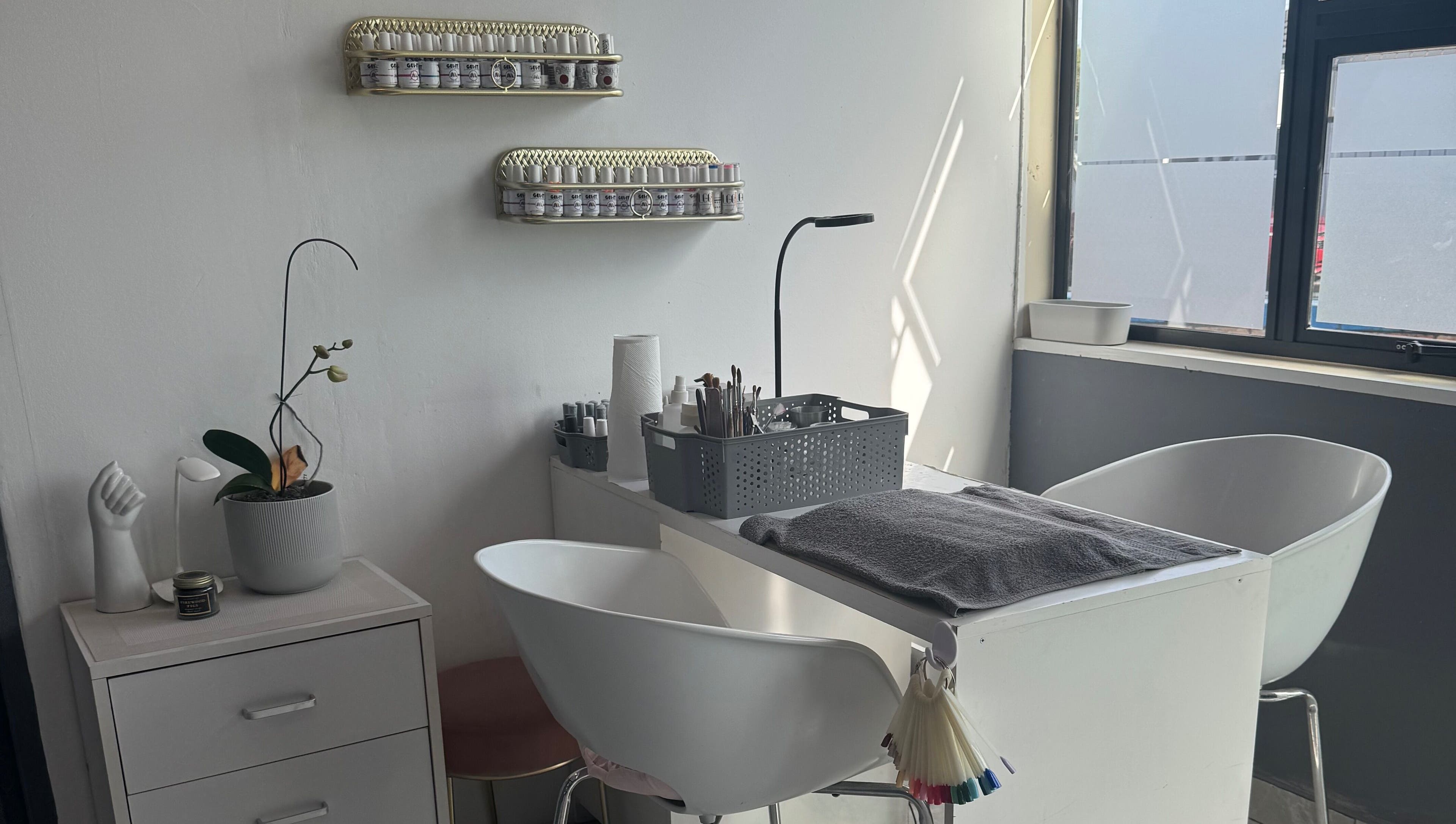 Modern nail station at Glam Nails&Beauty in Cape Town, Western Cape, ZA, featuring sleek design and essential tools.