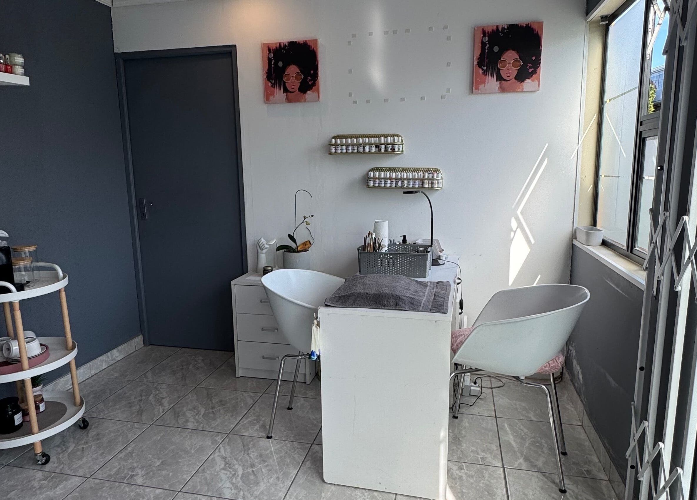 Chic nail station at Glam Nails&Beauty, Cape Town, Western Cape, ZA offering a serene pampering experience.