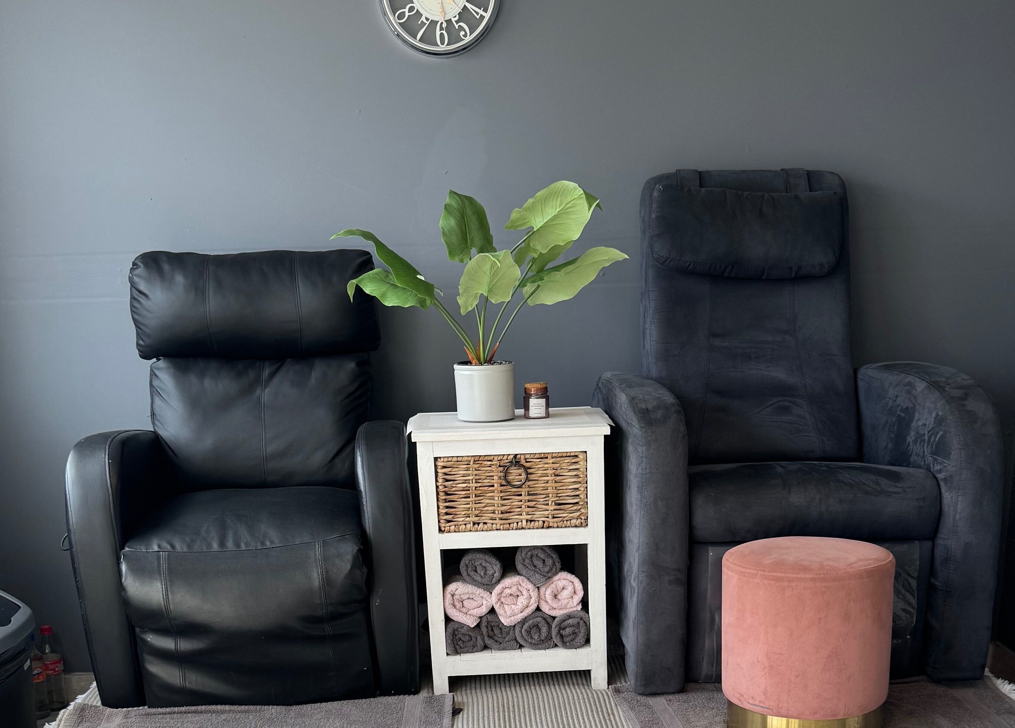 Cozy chairs and decor at Glam Nails&Beauty, Cape Town, Western Cape, ZA, offering a relaxing spa experience.