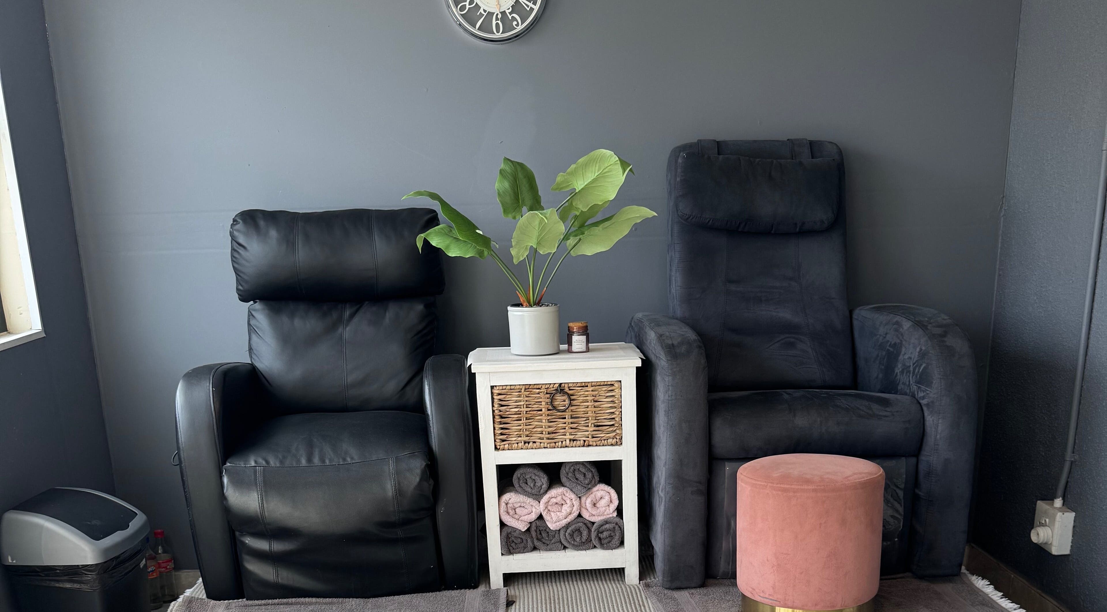 Cozy chairs and decor at Glam Nails&Beauty, Cape Town, Western Cape, ZA, offering a relaxing spa experience.