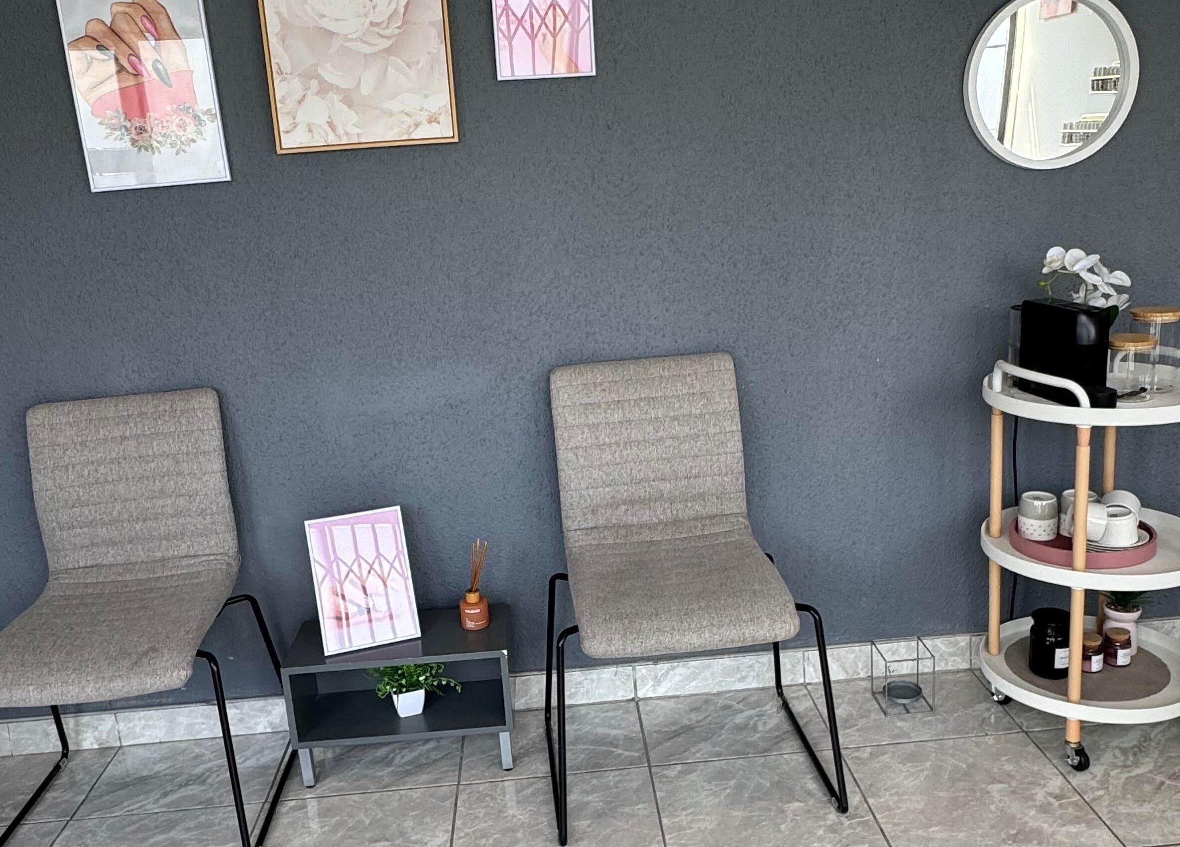 Chic waiting area at Glam Nails&Beauty in Cape Town, Western Cape, ZA. Modern chairs and decor create a welcoming vibe.