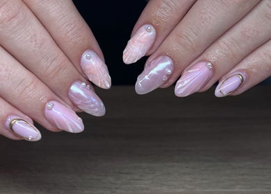 Elegant pearl manicure by BeautyByErica in Youghal, County Cork, IE with intricate designs.