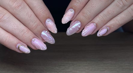 Elegant pearl manicure by BeautyByErica in Youghal, County Cork, IE with intricate designs.