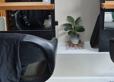 Modern salon chair and decor at Lela's Hair Lounge, Weston-super-mare, England, GB for a stylish experience.